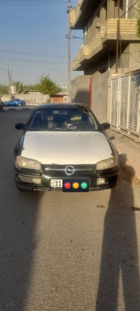 اوبل بزون موديل ١٩٩٦ رقم بغداد انكليزي سنويه لل٢٩   محرك ٢٠٠٠ كير عادي...