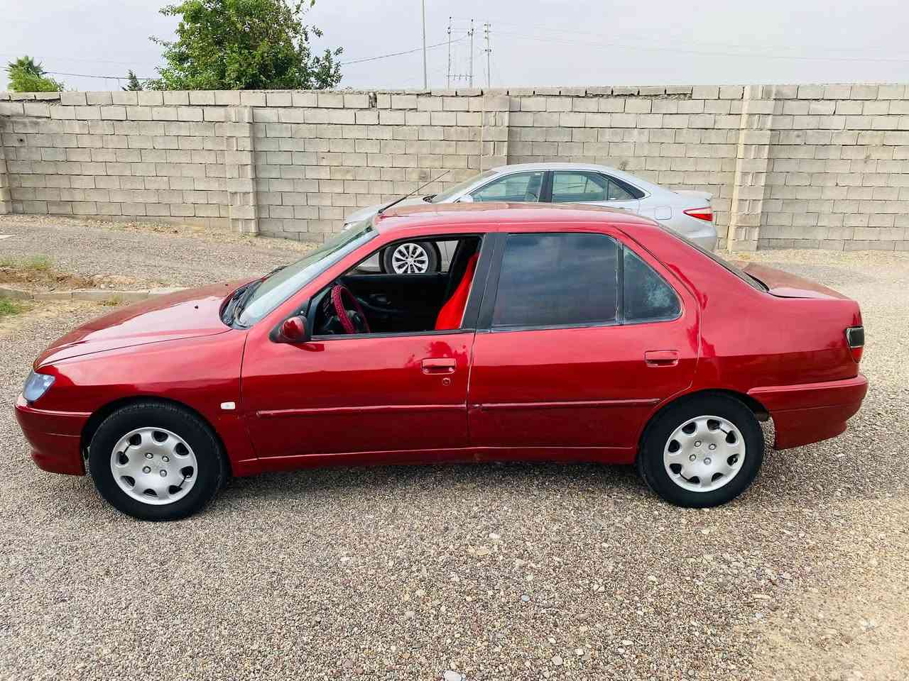 بيجو ٣٠٦ • ٢٠٠٢ • العلم