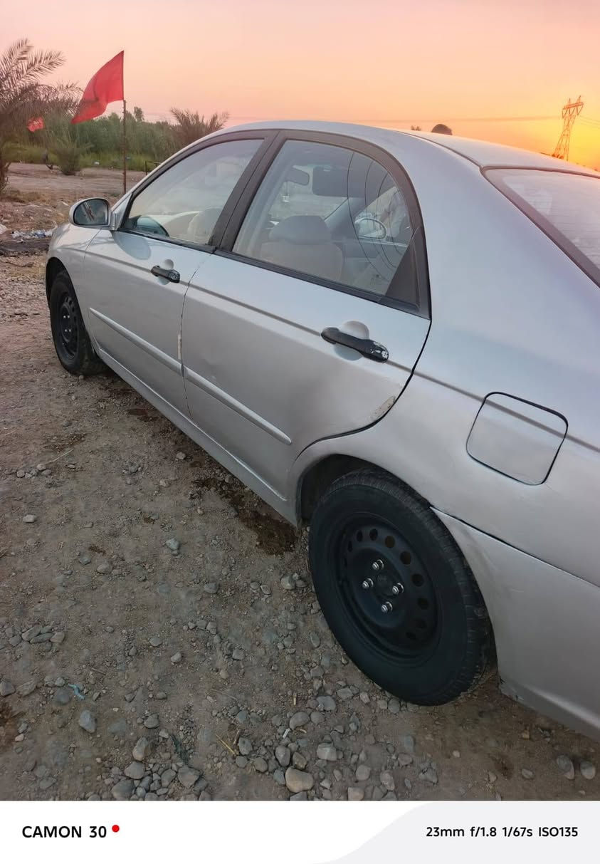 سلام عليكم  كيا سبكترا 2008 رقم نكليزي ادياله وارد امريكا طختين بل جاملغات الخلفيه بس السياره تبريد ثلج دوشمه السياره مرشوشه سبب الجراد ولباقي كفاله تحويل مباشر السعر 69 بيها مجال رقم ***********
