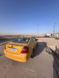 للبيع ليفان 2011 رقم بغداد بسمي كير و محرك ابلاد رقم 07703542513