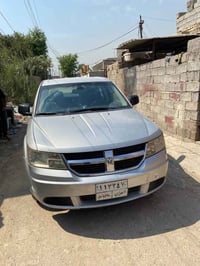 دوج جورني موديل ٢٠٠٩ بيع او مراوس حسب القناعه رقم سليمانيه  باسمي عندي...