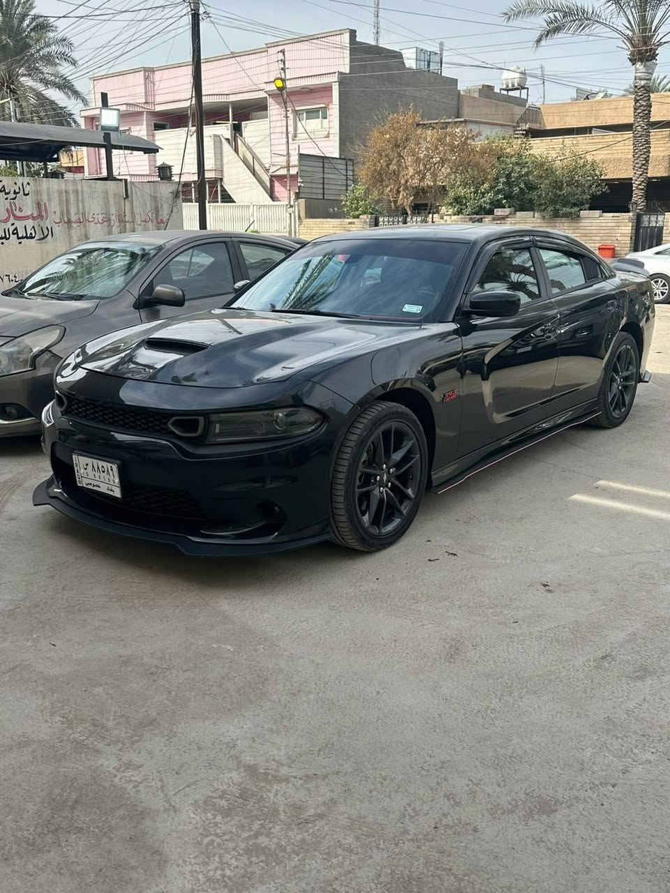 جارجر جي تي بلص
بيع او مراوس بسياره 7 راكب
CHARGER GT PLUS . 
‎الموديل :2022  . (وارد امريكي) . 
السياره ضربتها مثل ماموضح بلصور قطعه واحده تبديل البنيد ودعامية
مشاية 60 ميل رقم بغداد تحويل مباشر  . 
‎المحرك : V6.  3.6L
‎المواصفات :
‎* نسخة Black EDITION.  
.اوتو ويل درايف خلفي او رباعي *
‎* جناح خلفي اسود. 
‎* ويل قياس 20 انج  ‎
‎مقاعد رياضية حضن  
‎* مصابيح أمامية زنون . 
‎* كشافات الضباب زنون . 
‎* حساسات
‎× شاشه كبيرة
 نظام ملاحة نفكيشن GPS .
‎* الشاشة مع اوپشنات SRT . 
‎* سستم صوت الپاين .
‎* فتحت سقف (سلايد) . 
‎* مقاعد أمامية كهربائية عدد 1 . 
‎* تشغيل عن بعد . 
‎* محدد سرعة . 
‎* كاميرا خلفية .
‎* مرايا متحسسة للاضاءة العالية .
 . تحتوي على 3 انظمة*
.سوبر تراك *
‎* كير شفتر بالستيرن . 
‎* دخول ذكي (بصمة) .
بيها طخة على بارد ممسويها بلعراق 
الرقم
***********
السعر 22 الف 
وبيها مجال قليل
