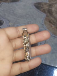 معطف • عرج داوودي • سياقة فضة