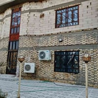 نص دونم • بيت طابقين • بستان