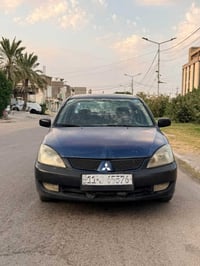 لانسر ٢٠٠٧ • محرك ٢٠٠٠ • رقم بغداد