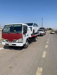 كرين صطحي مستعد لنقل كافه انواع السيارات داخل بغداد او خارج بغداد متوا...