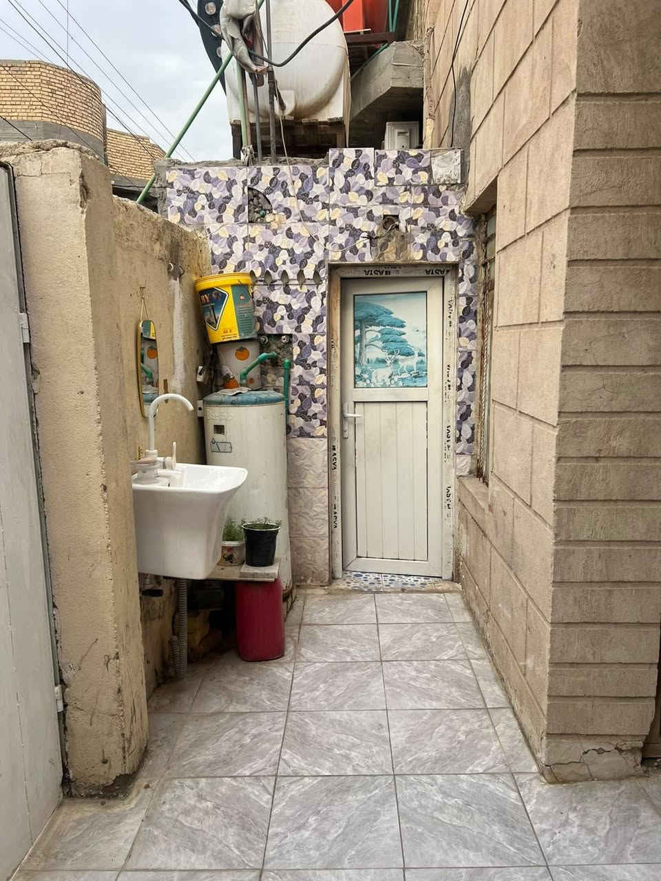 بيت تجاري • ١٥٧م • واجهة ١٢م