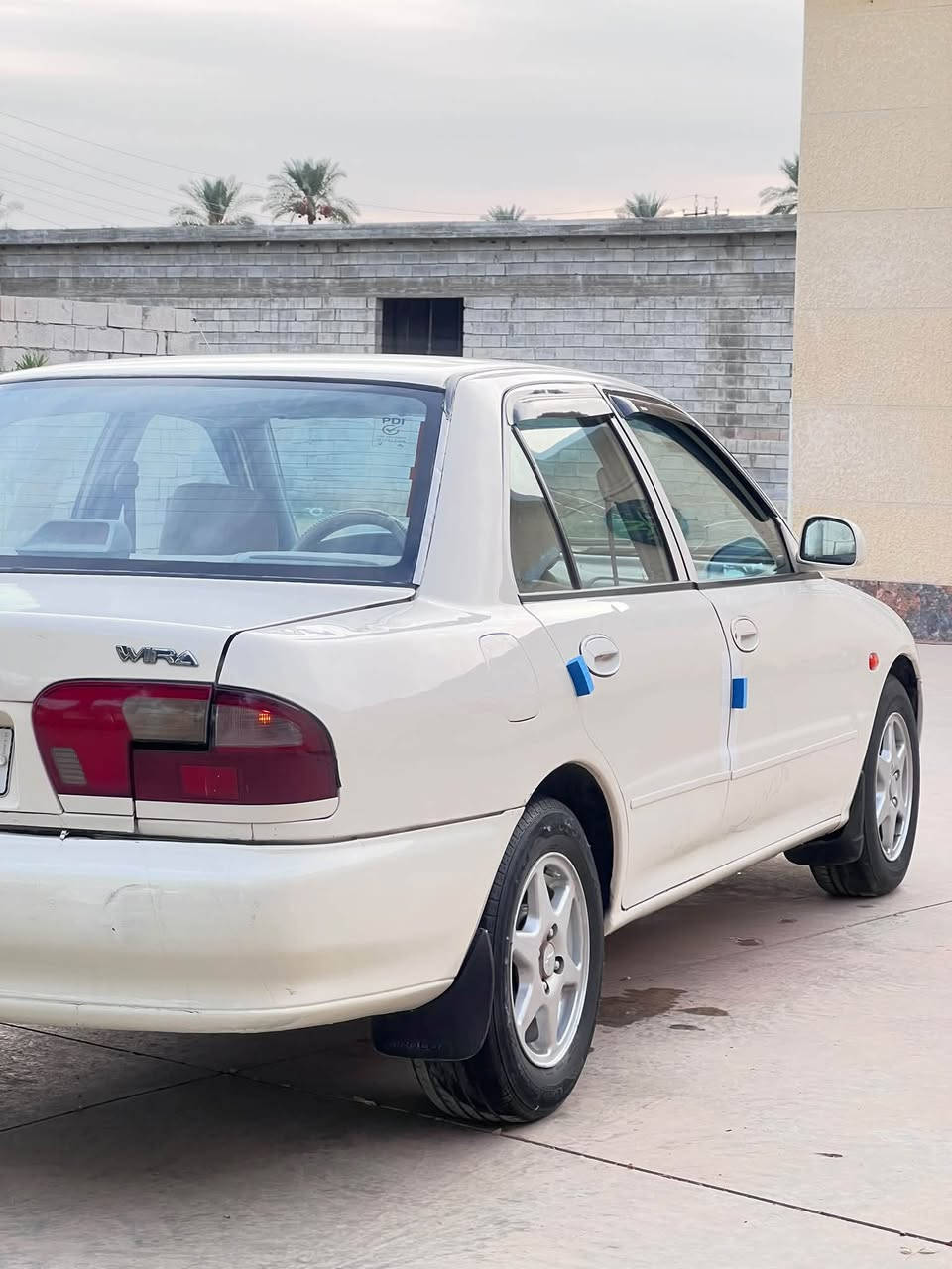 بروتون ٢٠٠٤ • رقم بغداد • الملكية باسمي