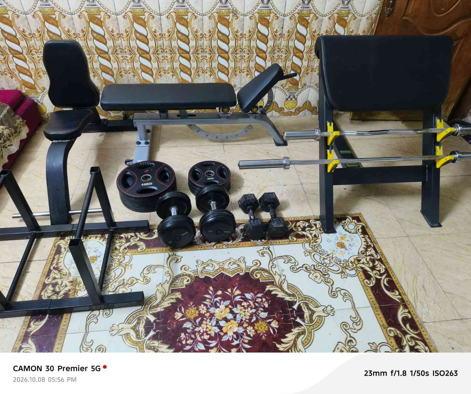 اجهزة رياضية امريكية • دمبل ٢٥كغ ٤٥كغ • كيس ملاكمة جلد