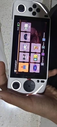 شوفلي هذا جهاز محمول  e6 بيه كلش هواي محاكيات  مثل ps1 psp  atari  seg...