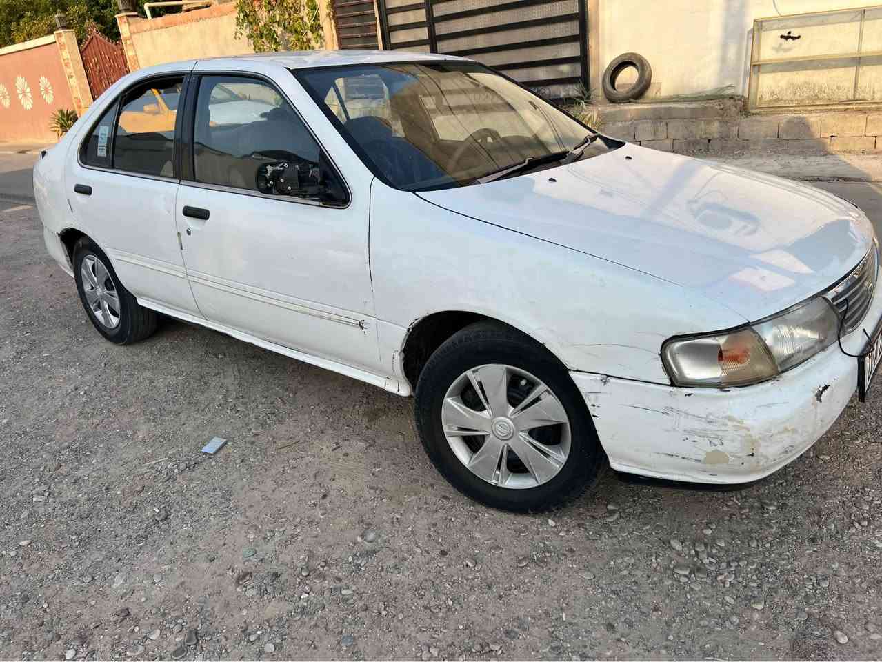 نيسان سني موديل 94 اوتماتيك كير محرك شرط 
سنويه جديد ودفتر بانزين موجود 
***********
واتساب كركوك, العراق
