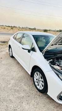 كورلا موديل ٢٠٢٣ SAS بانزين رقم اربيل بأسمي فول مواصفات عده الفتحه بصم...
