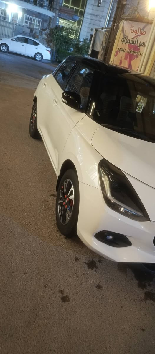 سازوكي سويفت Hybrid موديل 2025
مواصفات فول عدة الفتحة / 🚙
1- بصمة 
2- لد نهاري LED 
3- لايت زنون بلادي (عدسة) 
4- مانع انزلاق NSC 
5- اوتو ستوب AS🚫
6- كاميرا خلفية + رادار خلفي 🎦
7- رادار تصادم 
8- كروس مثبت سرعة ⏱️
9- محرك كهرباء شحن ذاتي (بانزين)
10- شفت سرعات 🚥
11- أبل واندرويد كار 🚏
12- بگ لايت LED 
13- تحديد مسار 🛣️
14- مري كهرباء شفط 
15- سقف اسود BLAK
16- شاشة لمس 📺
17- شاشة لوحة تحكم 
18- صرفيات الوقود (ممتاز) ⛽
19- لوحة التبريد بيانو 
20- بطارية عدد 2 ليثيوم 
21- تحكمات ستيرينج (سبيكر اتصال) 
22- دفتر ضمان (محرك وگير) 
23- ستيرينج كهربائي 
24- حجم الويل كاب 16 s
25- كشافات ضباب 
26- رقم بغداد دولي (جديد) 
27- اشارة ترحيبية 
28- ابواب بصمة 
29- وسائد هوائية عدد 8 
ملاحظة /   السيارة بحالة ممتازة جدا وكاملة من كلشي اقتصادية بانزين وهايبرد سعر 88وبيها مجال  مطلوبة للمصرف اقل 3سنة نضام وكالة/اتصل/***********
