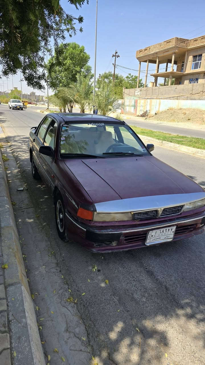 ميتسوبيشي كلن ٩٢
محرك سوناتا ١٨ 

كابونة بانزين 

تبريد ثلج شرط 🥶 

تنتنة 

تايرات جديدة 

كير عادي 

سيارة باسمي رقم ديالى سنوية ل ٢٨ وكالة او تحويل 
سعرها ٣٧ وبيها مجال

مكانها ديالى جلولاء
رقمي ***********
