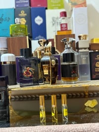 عطور فخمة • ٥مل • حضور ثگيل