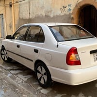 اكسنت • ٢٠٠٢ • فول اوبشن