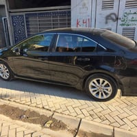 كورولا موديل 23 ساز بيه طخة خفيفة بالباب الخلفي والجاملغ مامصلح ماشية ...