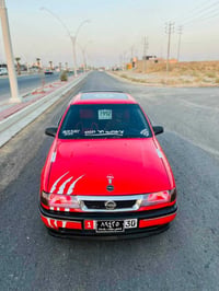 فيكترا 1992 • موتور 2.0 • رقم بغداد