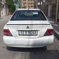 لانسر • ٢٠١١ • حادث خلفي