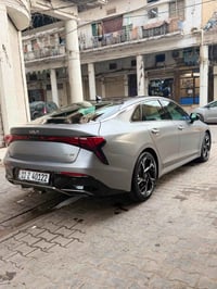 k5  2025 رصاصي مات للبيع وارد امريكي حادثهه قبغ جنطه مواصفات جي تي لاي...