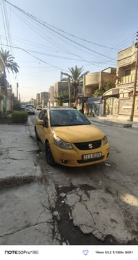 ساسوكيsx4 موديل 2009  محوره كير ومكينه كورلا يارس ١٦٠٠ المكينه نضيفه ح...