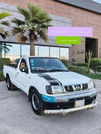 نيسان • ٢٠٠٢ • واتساب