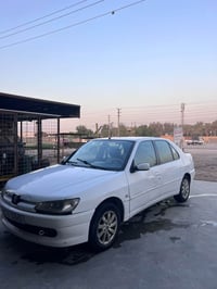 بيجو فرنسي 2001  306 الرقم بغداد ما بيه ولا قطره صبغ كير محرك مكفول عل...