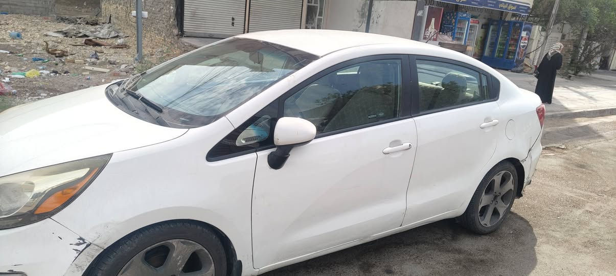السلام عليكم
كيا ريوا 2016 للبيع وارد امريكي محرك GDI 1.6L 
السنويه جديده تنتهي ب 2030 رقم بغداد السياره باسمي التبريد ثلج والتدفئه شغال نظام ايكو .ماشيه 76 الف ميل والتايرات جديده  .المحرك بي خيط تبخير بسيط جدا  والمشي طبيعي بدون اي مشاكل والدعاميات تحتاج تصليح او تبديل
السكن حي الخضراء 
هاتف ***********
