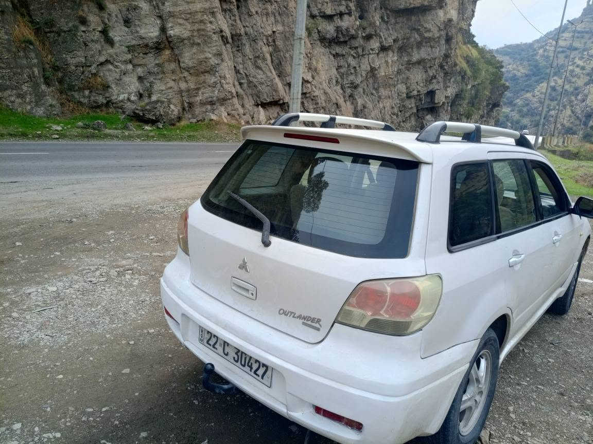 اوتلاندر ٢٠٠٣ • دبل اكسل AWD • اوتوماتيك