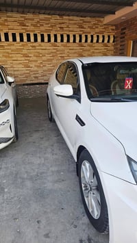 اوبتيما 2014 • محرك 2400 • فول عدا بانوراما