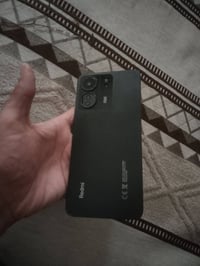 شباب ريدمي 13C ذاكرته256  بطاريته 6600انسه اكو شي اسمه شحن  بصمة وجه و...