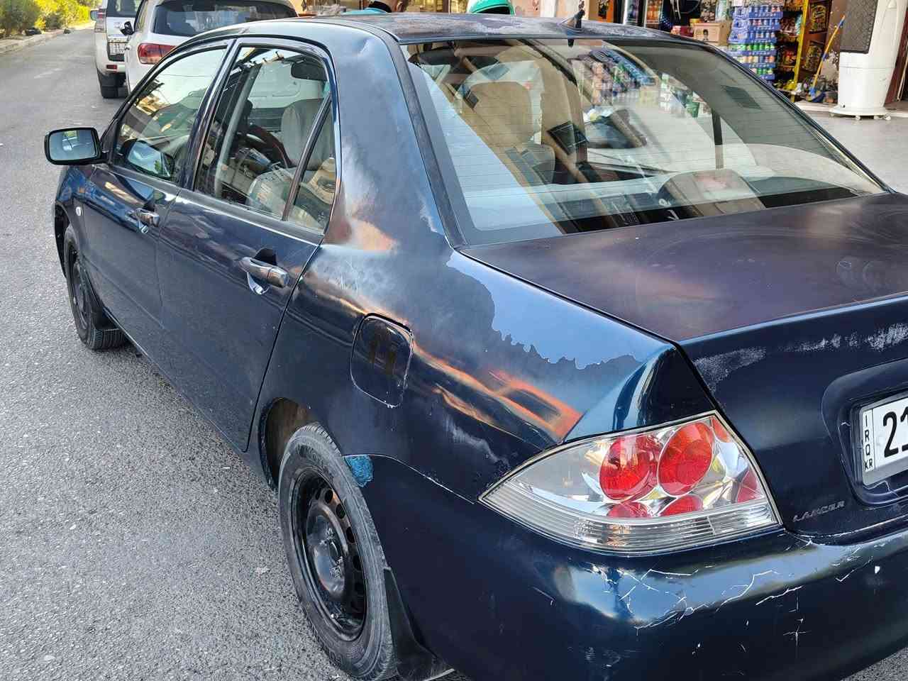 لانسر 2010 محركها بلادي  بدون صبغ بدون ضرر بدون تبديل محرك وكير مكفول تبريد ثلج تدفئة شغالة صدر جديد بدون اي نقص السيارة سعرها 68 وبيها مجال مكانها بعقوبة 
***********
