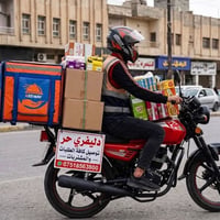 توصيل الموصل • سائق ملتزم • دراجة مرقمة