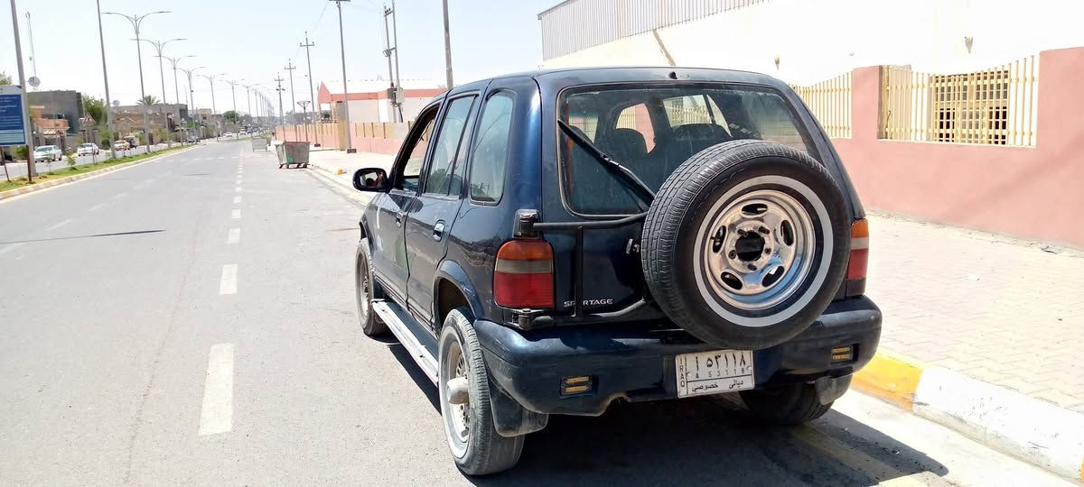 كيا سبورتاج 92 للبيع السعر 32وبي. مجال اشويه او مراوس ويه واز نضيف انطي فرق رقم موبايل***********
