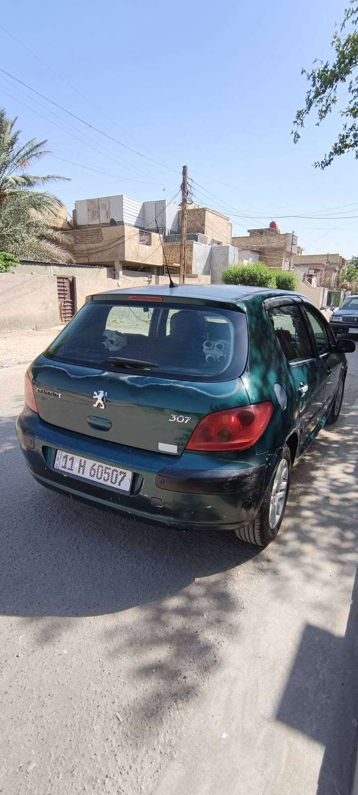 بيجو فرنسي 307 موديل 2005  رقم بغداد إنكليزي سنويه  لغاية 2030 بسمي السياره جارده.. وبيها ضربه على البارد الباب الخلفي جهة السائق محرك وكير حاويه .تبريدها خير من الله ثلج+ تدفئة بيها منظومة غاز حكومية 40 لتر..تخم تاير حتى السبير جديد بعده مانازل الگاع..وعدة متكامله.. الداخل على الابلاد.. مكانها بغداد الشعب.وسعرها 41 او مراوس 7 راكب/..***********..
