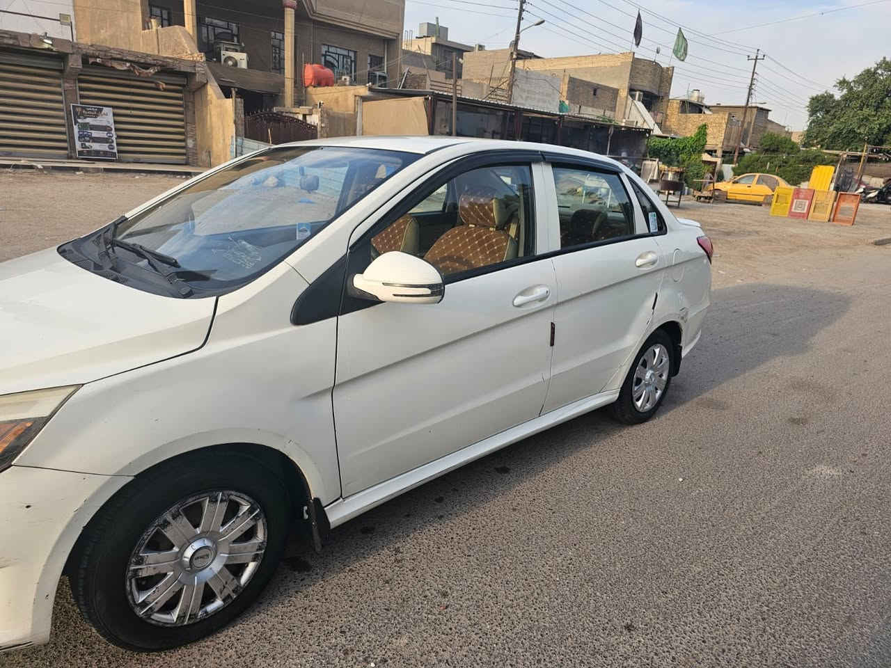 بايك ٢٠١٥ • أبيض • رقم بغداد