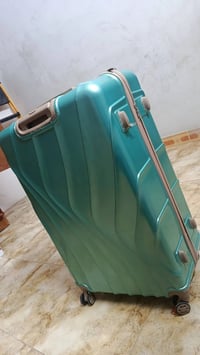 جنطة سفر • كبيره • ما مستخدمة