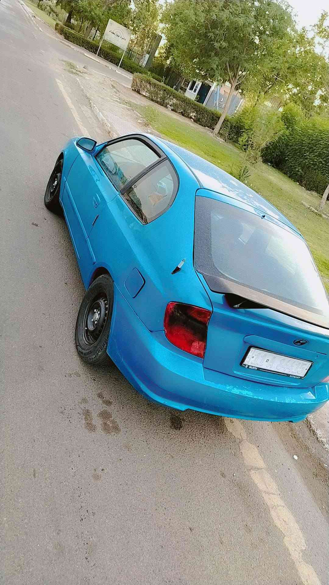 اكسنت • ٢٠٠٤ • رقم بغداد