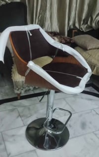 كرسي مكتبي ستالي ستيل  والخشب صاج حقيقي  والجلد طبيعي  أعلى ارتفاع متر...
