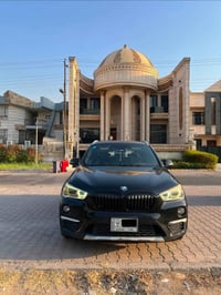 BMW X1 للبيع موديل 2017 ماشية ١٠٠ الف  رقم بغداد بااسمي مواصفاتها معرو...