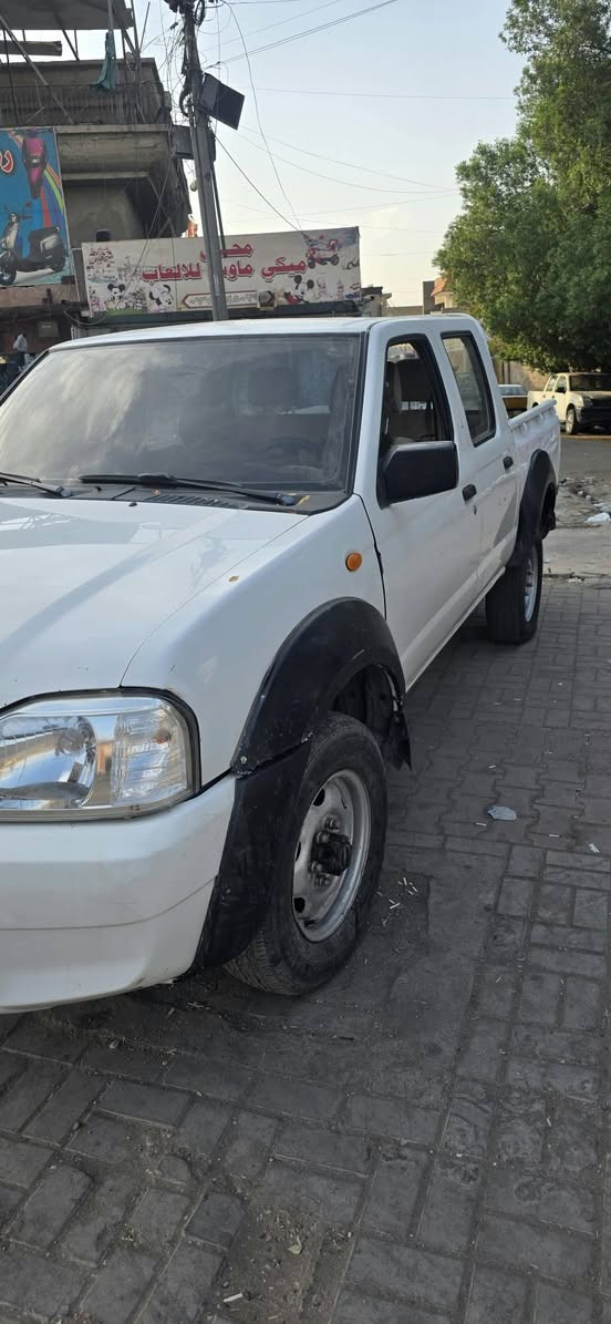 نيسان فور ويل • ٢٠٠٨ • كشنات جلد