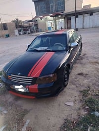 اوبتيما • ٢٠٠١ • رقم بغداد