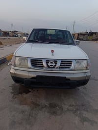 نيسان ٢٠٠٣ • مكينة وكير مكفول • مزاد الداخلية