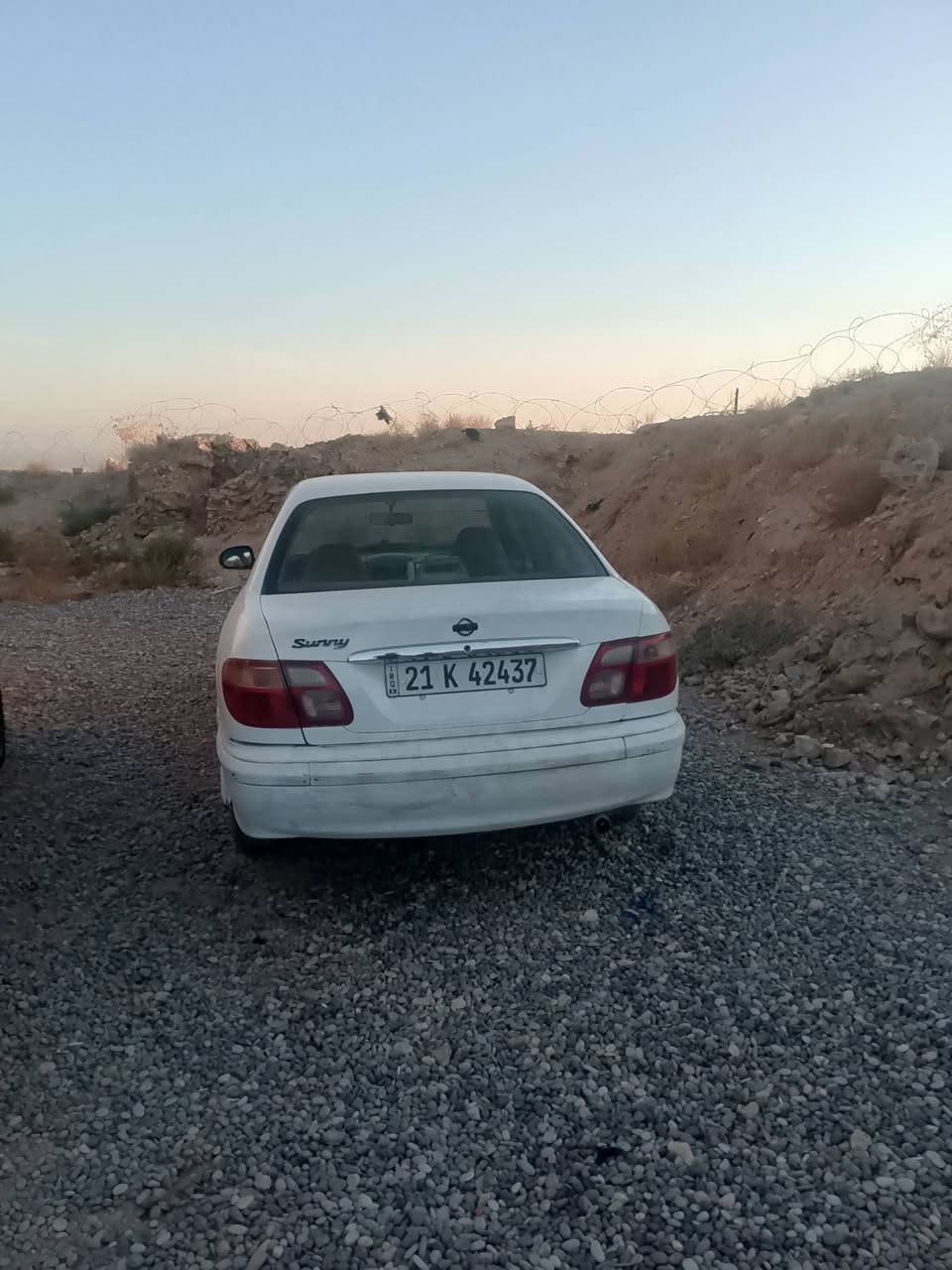 يلنيسان سني 2002 للبيع مابي كوبون  ضرر گدام خلف بس خفيف تبريد ثلج🥶🥶السعر 45 بي مجال قليل منان السياره كركوك(***********بي واتساب
