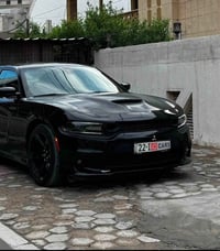 جارجر مديل 2020  sxt  وارد امريكي  ضرر جاملغ امامي جهه سايق مبدل بلادي...