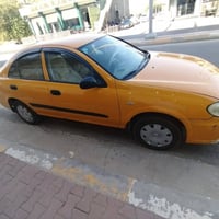 صني ٢٠١١ • أصفر • محرك شرط