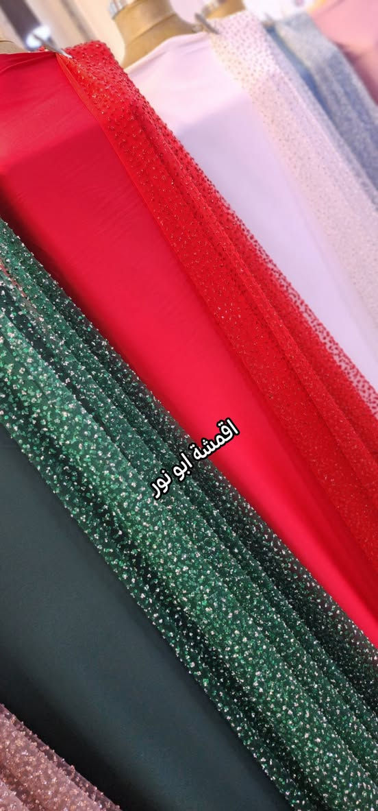 أعزائي الزبائن الكرام بفضل الله وصلت ارقى وأجمل الموديلات 🆗️🆗️
زي كوردي عرايسي كرستال مميز وراقي
 خاص للمناسبات والاعراس 💯💯
أرخص الأسعار وأفضل الماركات 
اقمشة ابو نور البزاز & جمله و مفرد 
خانقين مول ***********

نص مكتوب في الصور:
- اقمشة ابو نور