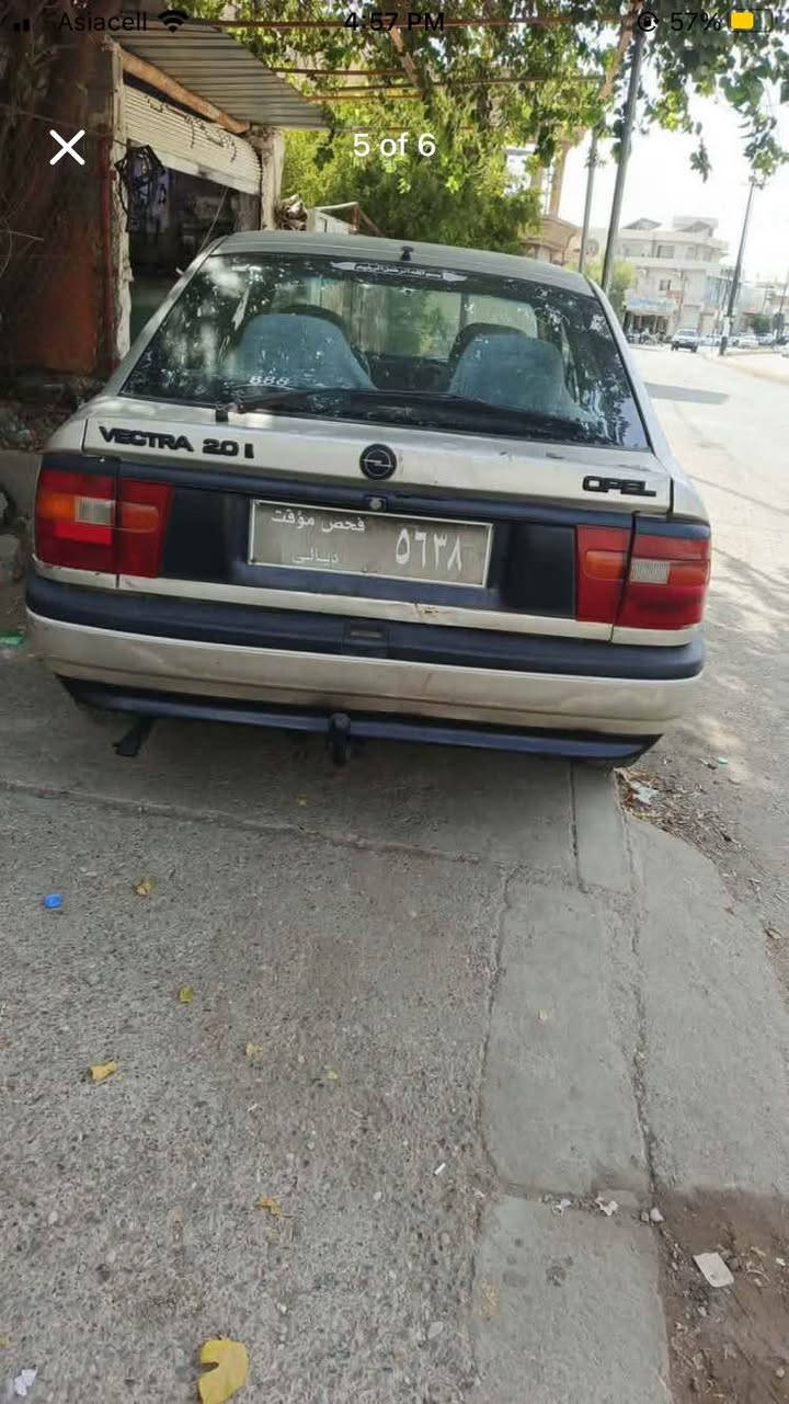 ئوپل فكترا 1991 علوج علوج 
مه كينه 20 ئه وروپي قه باغ ره ش 
گيرو مه كينه به شه رتي فيتر 
كاره بايي مه زبوته 4جام كاره با 
سه ياره كه كه فيلي مالي دزياري پاره ي كه سي تيا نه بي 
نرخي 9گه لا قفل قفل السليمانية, العراق

نص مكتوب في الصور:
- Asiacell 4:57 PM 57% 1 of 6
- Asiacell 4:57 PM 57%
- 2 of 6