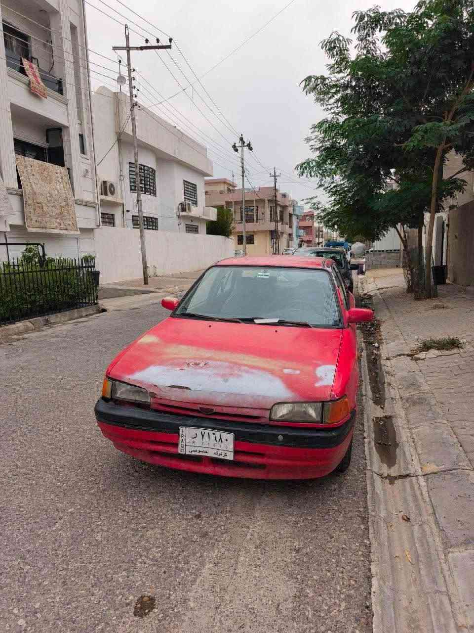 مازدا ٣٢٣ • اوتوماتيك • رقم كركوك