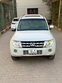 وبركاته  بابجيرو موديل 2014  ( السياره مكفوله من صبغ ومن تبديل) فقط با...